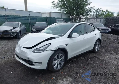 2023 Tesla Model Y Awd/Long Range Dual Motor All-Wheel Drive z USA, uszkodzony, nr VIN 7SAYGDEE2PA121795
